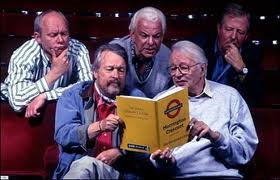 Graeme Garden, Barry Cryer, Tim Brooke-Taylor. Willie Rushton and Humph consulting the "rulebook"